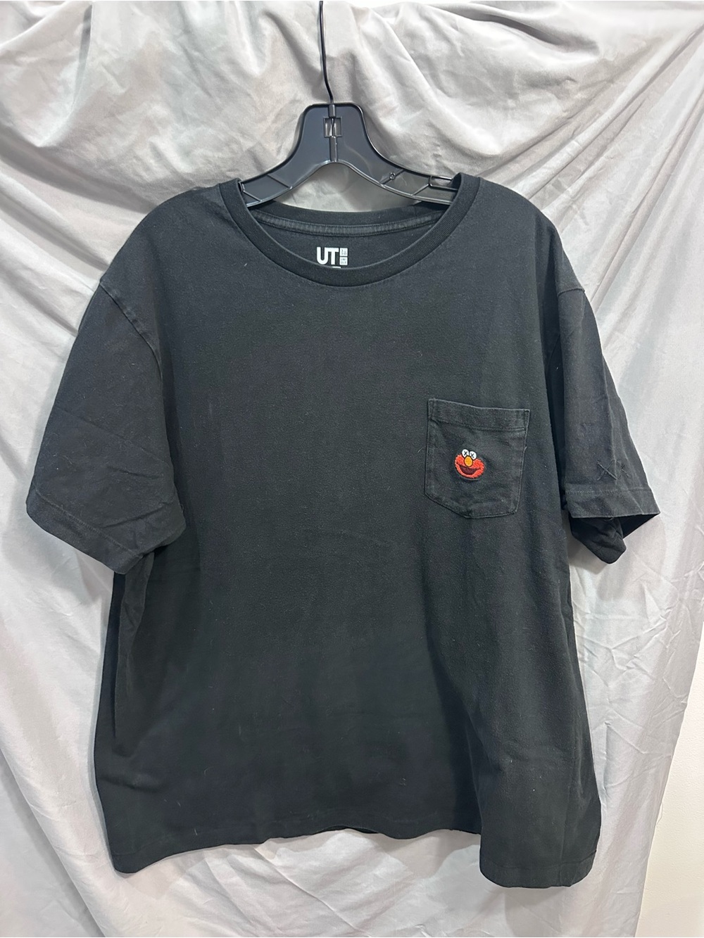 Uniqlo KAWS SESAME STREET Black Short-Sleeve Pocket Tee with Red Kaws Elmo Patch